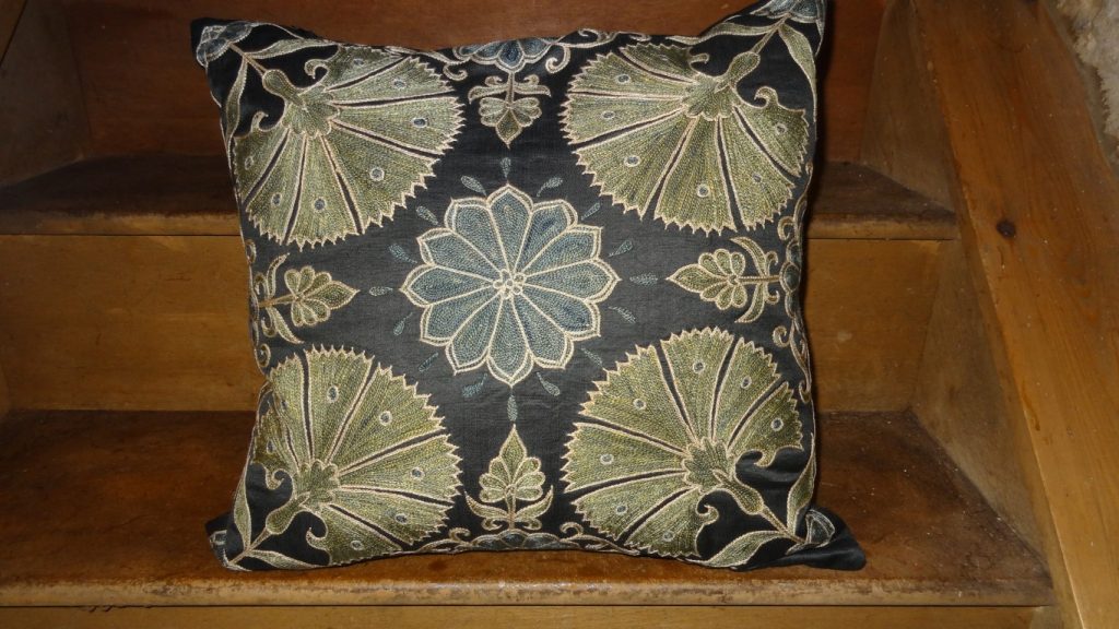 Hand stitched susani cushion from central Asia