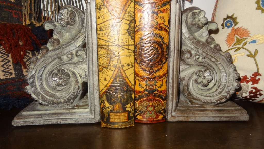 Carved wood curvelinear design bookends