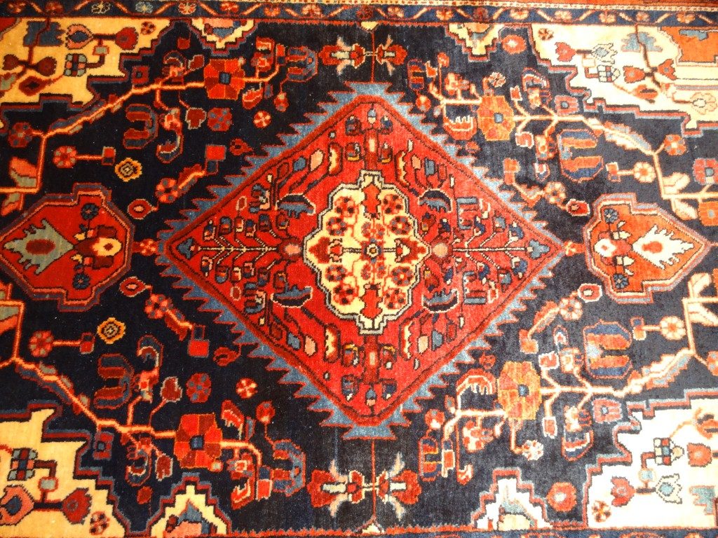 Semi-antique Nahavand carpet from Persia.