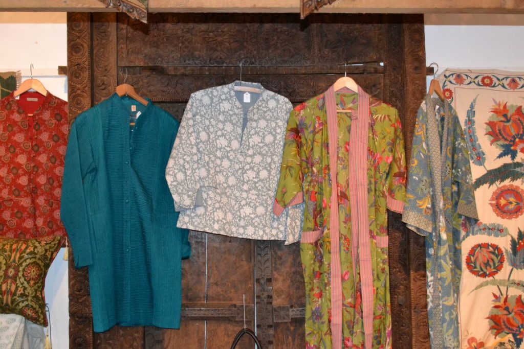 Oriental Coats and other clothing hanging on a rail