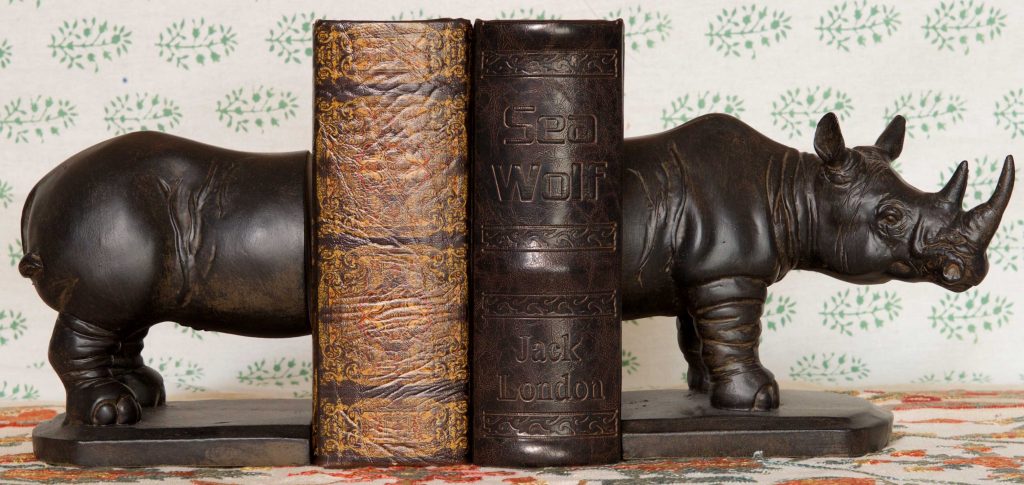 A Rhinoceros Carved Book End Set